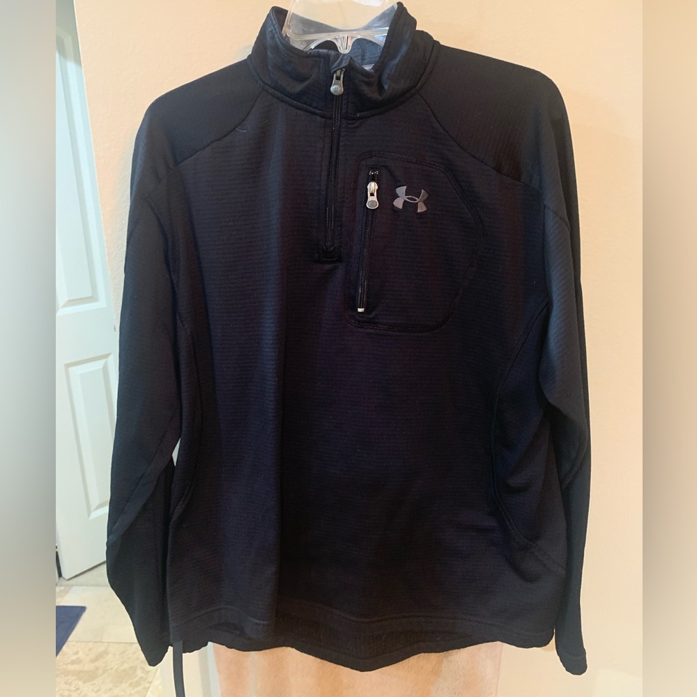 Under Armour quarter zip. Very good used condition.